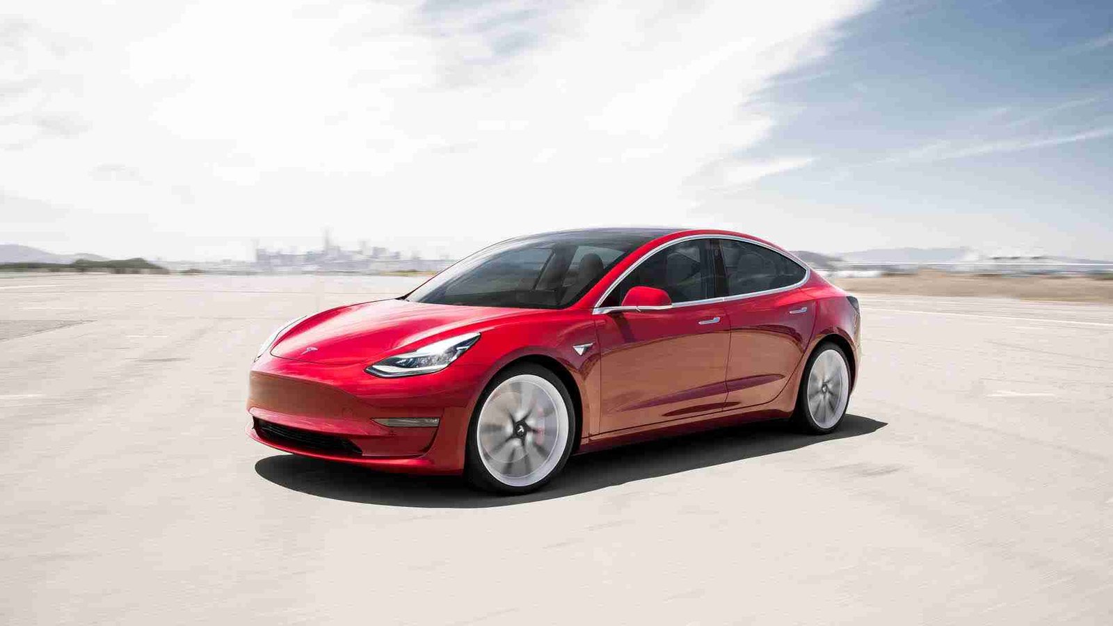 Base Tesla Model 3 gets more range, slower acceleration, $8,000 price hike vs. earlier this year
