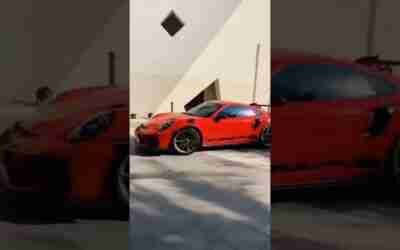 Which electric car goes the farthest on one charge? #cars #shorts