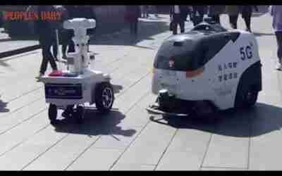 A police robot ran into a cleaning robot. The two AI "colleagues" were very "polite" to each other.
