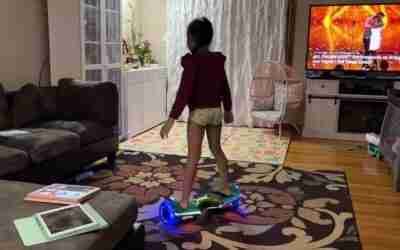 Debby and Annie riding hoverboard