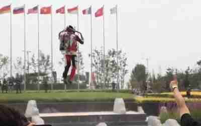 Human flying with jet pack in Beijing