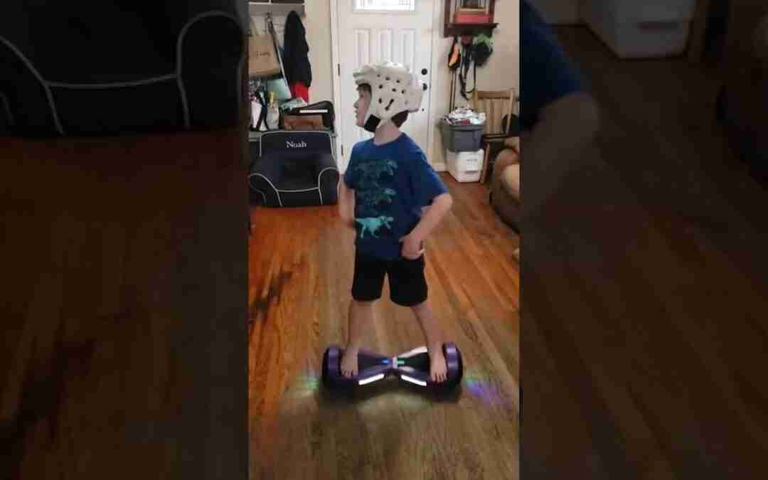 Noah on a hoverboard