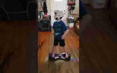 Noah on a hoverboard