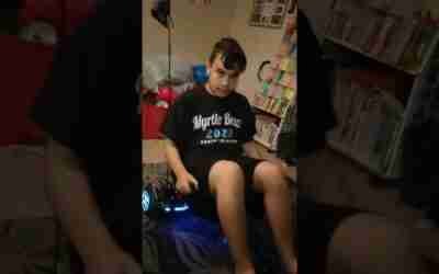 My 15 year old  doing a demo on hoverboard go kart