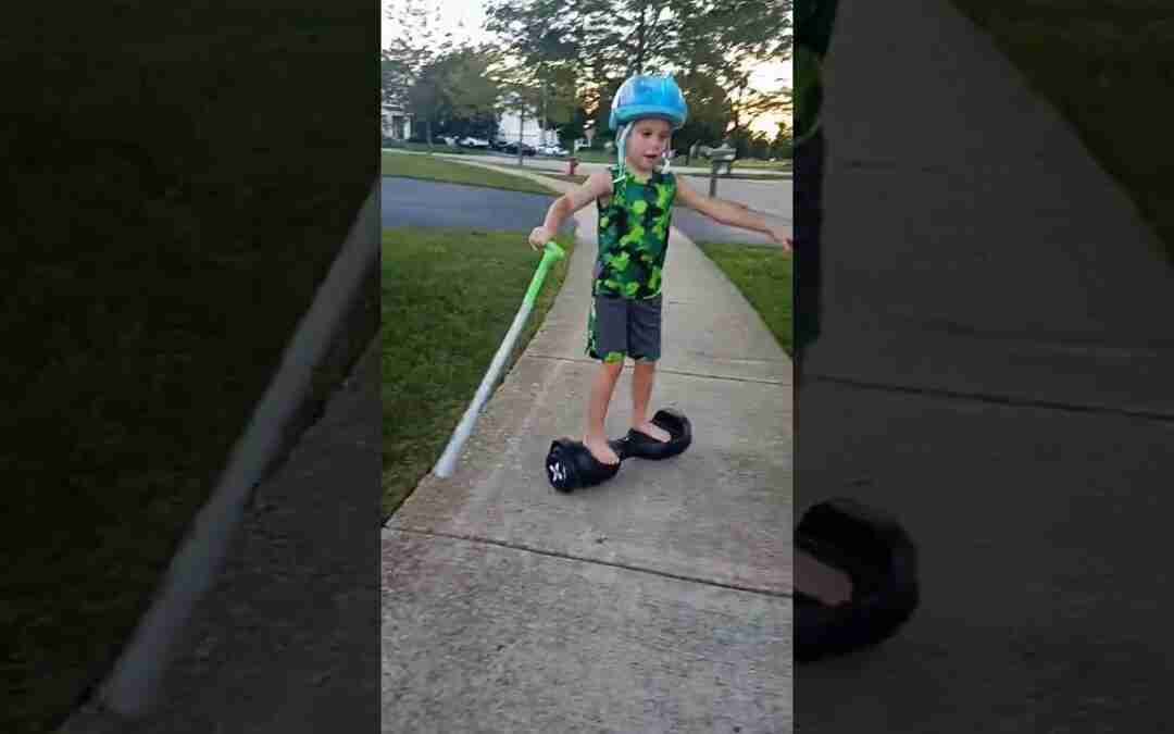 brother riding hoverboard
